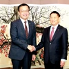 Phó Thủ tướng kiêm Bộ trưởng Tài chính Hàn Quốc Choi Sang Mok tiếp Bộ trưởng Bộ Tài chính Hồ Đức Phớc. (Ảnh: Trường Giang/TTXVN)