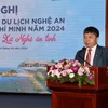 Ông Nguyễn Văn Nam, Phó Giám đốc Trung tâm xúc tiến đầu tư, thương mại và du lịch tỉnh Nghệ An phát biểu tại hội nghị. (Ảnh: Mỹ Phương/TTXVN)