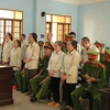 10 bị cáo bị tuyên phạt về tội hoạt động nhằm lật đổ chính quyền nhân dân. (Ảnh: Quang Thái- TTXVN)