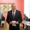 Tổng thống Litva Gitanas Nauseda tại một điểm bầu cử Tổng thống ở Vilnius ngày 12/5/2024. (Ảnh: AFP/TTXVN)