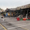 Hiện trường vụ cháy tại Trung tâm thương mại Sa Pa của người Việt Nam tại Prague vào rạng sáng 10/6. (Ảnh: Ngọc Biên/TTXVN)