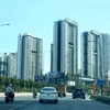 Khu căn hộ chung cư ở thành phố Thủ Đức nhìn từ đại lộ Võ Nguyên Giáp. (Ảnh: Hồng Đạt/TTXVN)
