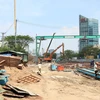 Công trường dự án hầm chui nút giao Nguyễn Văn Linh-Nguyễn Hữu Thọ tháng 3/2024. (Ảnh: Tiến Lực/TTXVN)