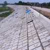 Tỉnh Nam Định đầu tư gia cố xây dựng kè mái đê sông Tả Đáy, huyện Ý Yên. (Ảnh: Công Luật/TTXVN)