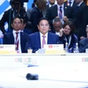 Thủ tướng Phạm Minh Chính phát biểu tại Phiên toàn thể Hội nghị các Nhà lãnh đạo Nhóm BRICS mở rộng. (Ảnh: Dương Giang/TTXVN)