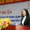 Bà Hoàng Thị Thơm, Phó Cục trưởng Cục Dân số (Bộ Y tế) phát biểu. (Ảnh: TTXVN phát)