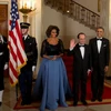 Bà Michelle Obama diện váy xòe tiếp Tổng thống Pháp