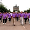 Bô Ngoại giao Lào tổ chức đi bộ kỷ niệm 17 năm gia nhập ASEAN