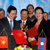 Việt Nam-Lào ký BTA: Xóa bỏ thuế cho hơn 95% mặt hàng