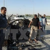 Hiện trường một vụ đánh bom tại Iraq. (Nguồn: AFP/TTXVN)