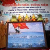Bức tranh “Gạc Ma - Vòng tròn bất tử” được bán đấu giá 1,28 tỷ đồng, ủng hộ gia đình 64 liệt sỹ hy sinh tại đảo Gạc Ma. (Ảnh: Thanh Vũ/TTXVN) 