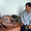 Một người dân có triệu chứng như bệnh bạch hầu được điều trị tại Trung tâm y tế huyện Phước Sơn. (Ảnh: Đỗ Trưởng/TTXVN)