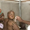 Tiêm vắcxin RTS,S cho trẻ em châu Phi. (Nguồn: isglobal.org)