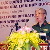 Thứ trưởng Bộ Quốc phòng Nguyễn Chí Vịnh phát biểu tại hội thảo. (Ảnh: Trọng Đức/TTXVN)