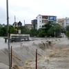 Nước lũ tràn vào thành phố Uông Bí, Quảng Ninh, sáng 2/8. (Ảnh: Nguyễn Hòng/Vietnam+)