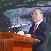 Chủ tịch Quốc hội Nguyễn Sinh Hùng đọc diễn văn tại buổi lễ. (Ảnh: Nhan Sáng/TTXVN) 