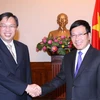  Phó Thủ tướng, Bộ trưởng Ngoại giao Phạm Bình Minh tiếp Bí thư Thường trực Bộ Ngoại giao Singapore Chee Wee Kiong (Ảnh: Thống Nhất/TTXVN) 
