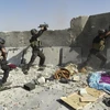 Quân đội Iraq giao tranh với các chiến binh IS tại thành phố Ramadi. (Nguồn: Reuters)