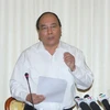 Phó Thủ tướng Nguyễn Xuân Phúc. (Ảnh: Thanh Vũ/TTXVN)