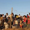 Người tị nạn Syria tại biên giới với Thổ Nhĩ Kỳ ở Hatay. (Nguồn: EPA)