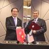 Bộ trưởng Trần Đại Quang và Phó Thủ tướng Malaysia ký Hiệp định hợp tác về phòng, chống tội phạm xuyên quốc gia. (Ảnh: Kim Dung-Chí Giáp/Vietnam+) 