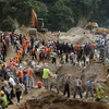 Lực lượng cứu hộ làm việc tại hiện trường vụ lở đất ở Santa Catarina Pinula, ngày 3/10. (Nguồn: Reuters/ TTXVN)