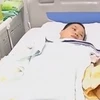 Chị Li Juan đang được điều trị tại bệnh viện sau khi bị chó cắn. (Nguồn: CCTVNews) 