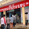 Cử tri ở xã biên giới Mô Rai, huyện Sa Thầy bỏ phiếu Bầu cử Quốc hội khóa XIII. (Ảnh: Trần Lê Lâm/TTXVN)