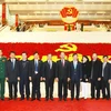 Các đại biểu Đảng bộ tỉnh Bình Dương tham dự Đại hội Đảng. (Nguồn: TTXVN)