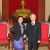 Tổng Bí thư Nguyễn Phú Trọng tiếp bà Sunthon Saynhachac, đặc phái viên của Tổng Bí thư Đảng Lào. (Ảnh: Trí Dũng/TTXVN) 