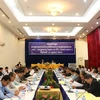 Quang cảnh hội nghị tổng kết 10 năm hợp tác phát triển cụm bản khu vực biên giới Việt Nam-Lào. (Ảnh: Phạm Kiên/TTXVN) 