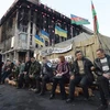 Các nhà hoạt động Maidan ngồi tại một góc của Quảng trường Độc lập. (Nguồn: AP)