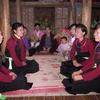  Đội văn nghệ hát Sình Ca dân tộc Cao Lan ở xã Kim Phú, huyện Yên Sơn. (Ảnh: Quang Đán/TTXVN) 