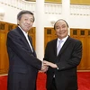 Phó Thủ tướng Nguyễn Xuân Phúc tiếp ông Hayashi Motoo, Bộ trưởng Bộ Kinh tế, Thương mại và Công nghiệp Nhật Bản.(Ảnh: An Đăng/TTXVN) 