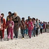 Người tị nạn Syria. (Nguồn: faithit.com)