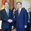 Chủ tịch nước Trần Đại Quang tiếp Chủ tịch ADB Takehiko Nakao. (Ảnh: Nhan Sáng/TTXVN) 