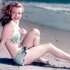 Siêu sao Marilyn Monroe nóng bỏng với bikini năm 1962. (Nguồn: Dailymail)