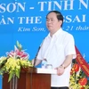 Chủ tịch nước Trần Đại Quang phát biểu tại Lễ khánh thànhTrường Trung học Phổ thông Kim Sơn C. (Ảnh: Nhan Sáng/TTXVN)