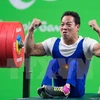 Niềm vui của vận động viên Lê Văn Công sau khi hoàn thành nội dung cử tạ nam hạng 49kg tại Paralympic 2016. (Nguồn: THX/TTXVN)