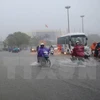 Ngập lụt trên đường Hà Nội (khu vực vòng xoay ngã 6, trung tâm thành phố Huế). (Ảnh: Hồ Cầu/TTXVN) 