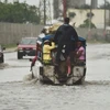 Hoàn lưu siêu bão Matthew gây mưa lớn, ngập lụt ở thủ đô Port-au-Prince, Haiti. (Nguồn: AFP)