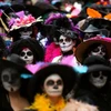 Hóa trang giống nhân vật Catrina tại lễ hội của người chết ở Mexico. (Nguồn: NatGeo)