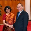 Thủ tướng Nguyễn Xuân Phúc tiếp bà Pratibha Mehta, Điều phối viên Thường trú Liên hợp quốc, kiêm Trưởng Đại diện UNDP đến chào từ biệt. (Ảnh: Thống Nhất/TTXVN)