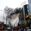 Hiện trường vụ cháy nghiêm trọng tại quán karaoke 68 Trần Thái Tông. (Ảnh: Minh Sơn/Vietnam+)