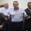 Cựu Tổng thống El Salvador Elias Antonio Saca (giữa) tại phiên tòa ở San Salvador ngày 4/11. (Nguồn: EPA/TTXVN) 