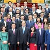 Chủ tịch nước Trần Đại Quang với các đại biểu tại buổi tiếp. (Ảnh: Nhan Sáng/TTXVN) 