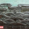 Hình tượng biển Đông Hải được khắc trên Cao đỉnh. Biển Đông Hải có quần đảo Trường Sa và Hoàng Sa được khắc vào năm 1836 dưới triều vua Minh Mạng. (Ảnh: Hoàng Quang Hà)