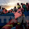 Người di cư được cứu trên Địa Trung Hải, cách Libya khoảng 37km về phía Bắc ngày 3/10. (Nguồn: AFP/TTXVN)