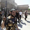 Một tay súng của nhóm phiến quân Ghuraba al-Sham. (Nguồn: Reuters)