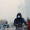 Tình trạng ô nhiễm không khí nghiêm trọng tại Bắc Kinh, Trung Quốc. (Ảnh: THX/TTXVN)